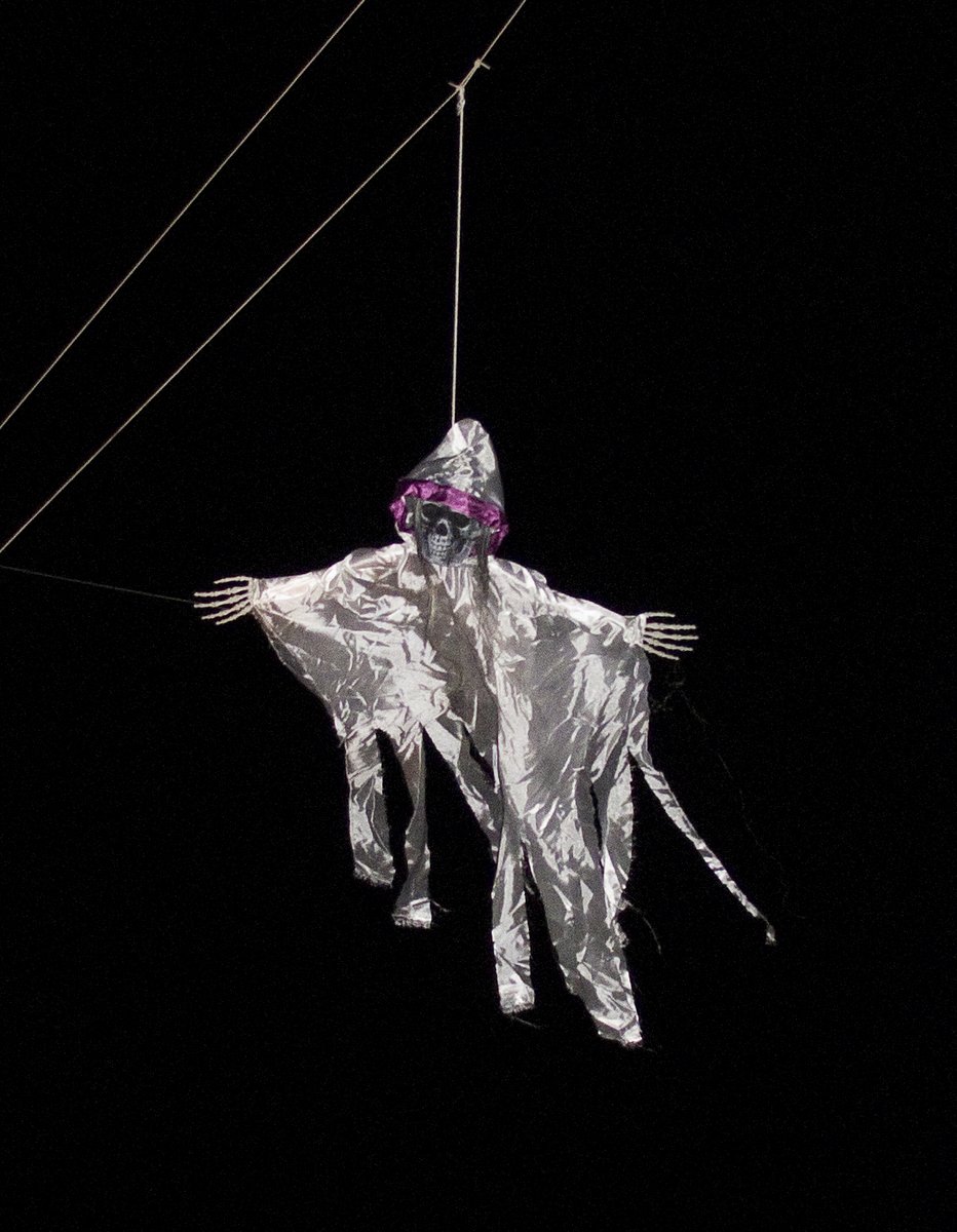 A Ghoul flies above Alba on Halloween A Ghoul flies above Alba on Halloween