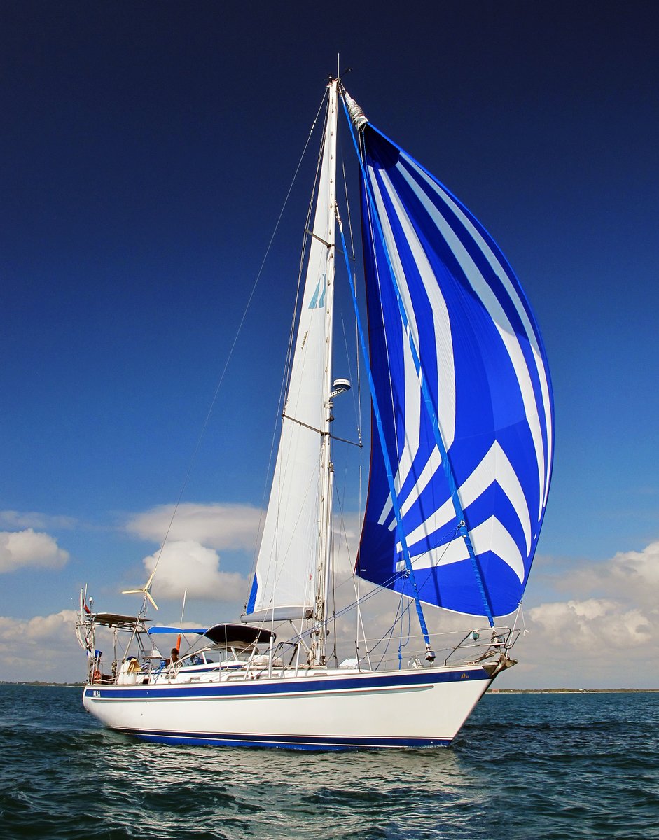 Flying our asymmetrical spinaker, Belize Flying our asymmetrical spinaker, Belize
