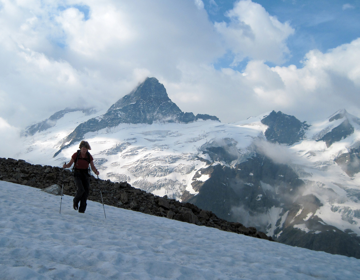 Early morning walk across snow with the Klein Schreckhorn behind Early morning walk across snow with the Klein Schreckhorn behind