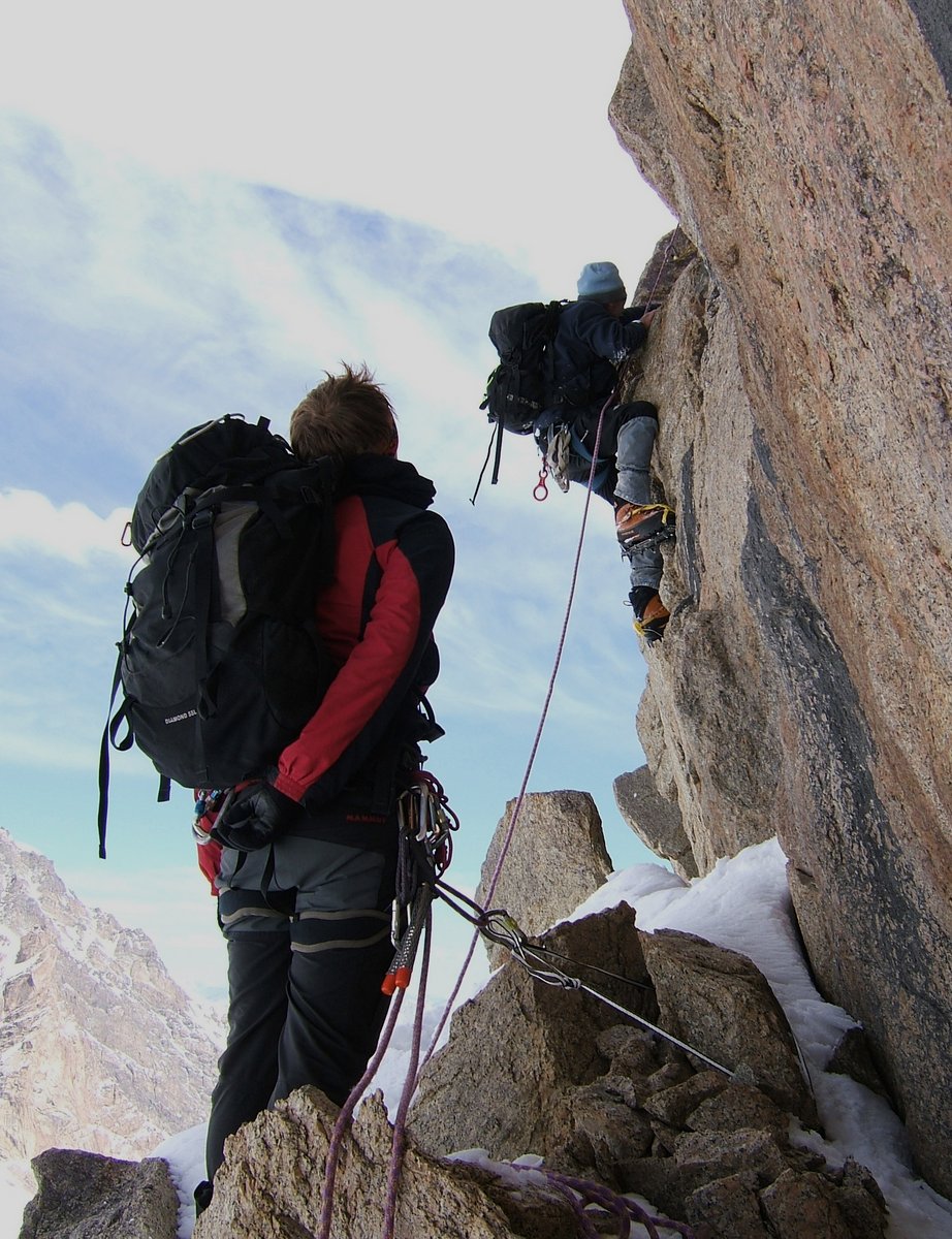 Climbing the rock tower on Pik Judith-Brian, Kyrgyzstan Climbing the rock tower on Pik Judith-Brian, Kyrgyzstan